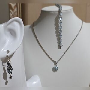 BLUE TOPAZ SET OF EARRINGS, BRACELET AND A PENDANT ON A 30 INCH NECKLACE ALL 925